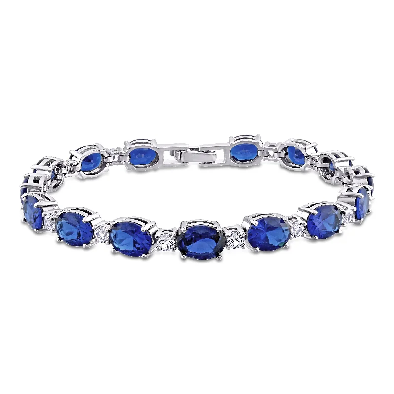 Buy More, Save More On Stunning Jewelry Pieces 32 CT TGW Oval Created Blue and White Sapphire Bracelet in Sterling Silver