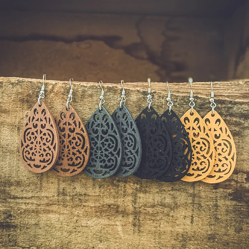 Grab Exquisite Jewelry At The Lowest Prices Set of Four Beautiful Carved Wood Earrings