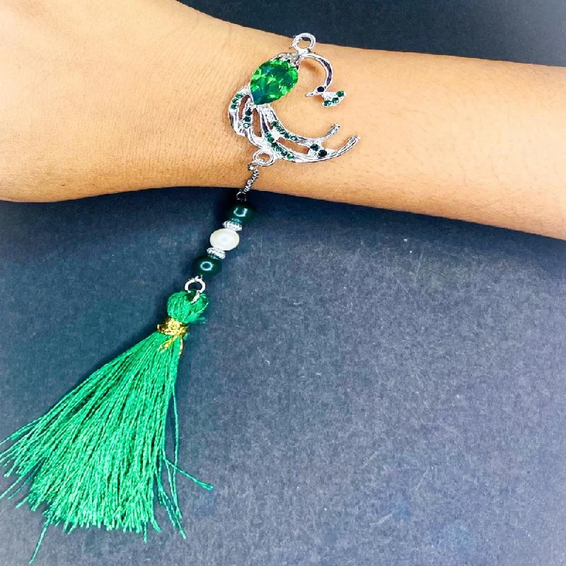 Shop Trending Jewelry With Exclusive Savings Mahi Rhodium Plated Peacock-Shaped Green Crystals Lumba Rakhi with Tassel for Bhabhi (RAL1100793RGre)