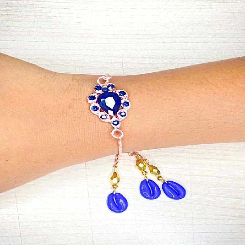 Grab Your Dream Jewelry At The Lowest Prices Mahi Rose Gold Plated Blue Crystals Studded Simple and Classic Lumba Rakhi for Bhabhi (RAL1100795ZBlu)