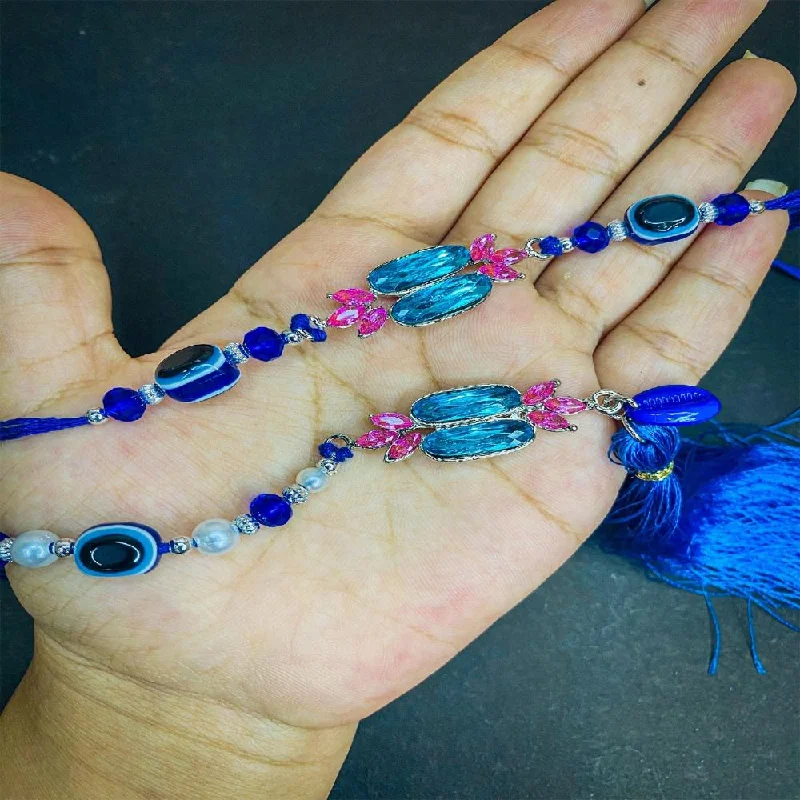 Special Deals On Handcrafted And Designer Jewelry Mahi Simple and Classic Blue Crystals and Evil Eye Lumba and Brother Rakhi Set for Bhaiya and Bhabhi (RCOL1105673R)